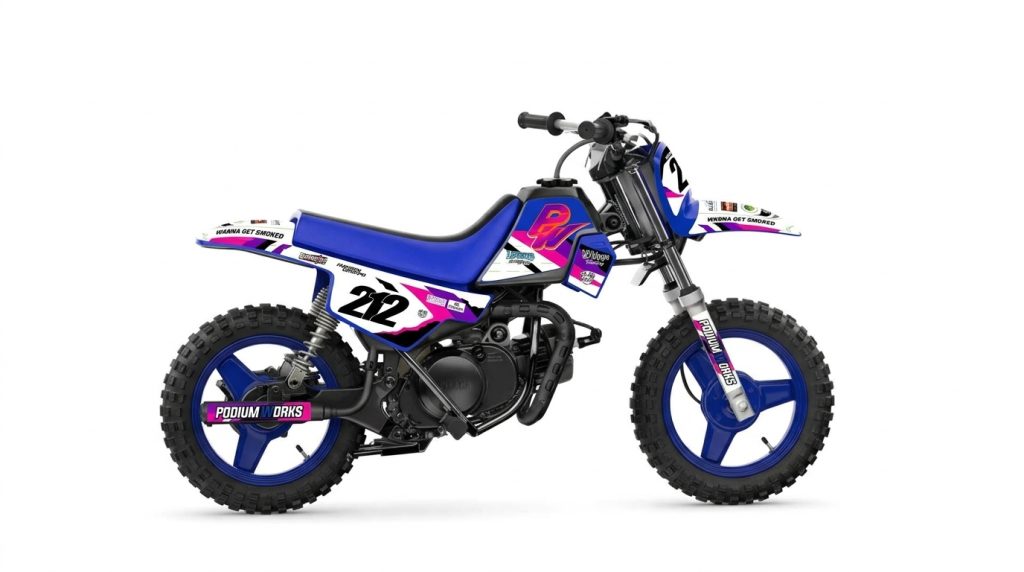 Yamaha PW50 White, Hot Pink & Purple Retro Custom Motocross Full Coverage Graphics Kit installed on a dirt bike