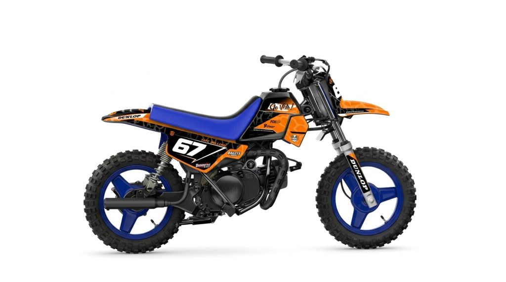 Yamaha PW50 Vibrant Orange Leopard Print & Black Custom Motocross Full Coverage Graphics Kit installed on a dirt bike